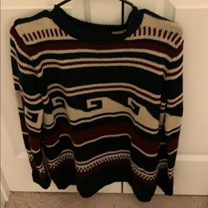 Pullover sweater with designs